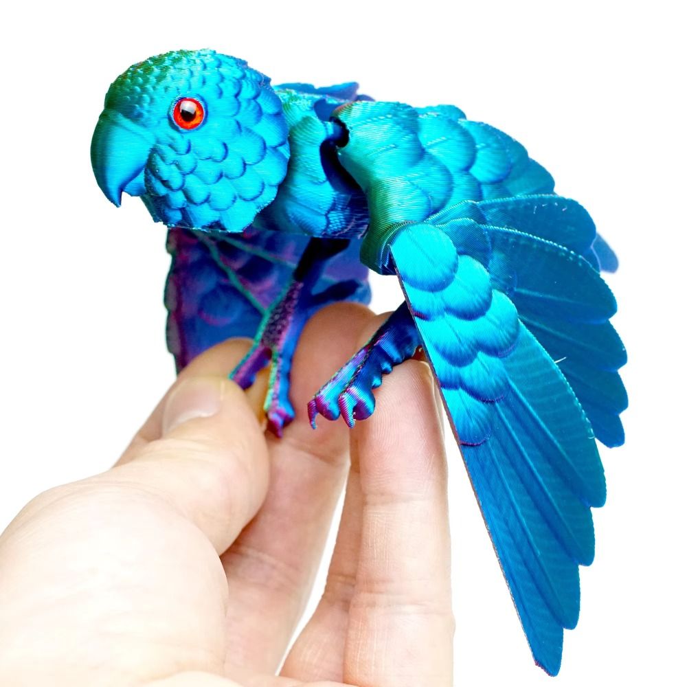 3D Printing Idea - Simuliertes Auge 3D-gedrucktes Papageienmodell Funkelnder Laser